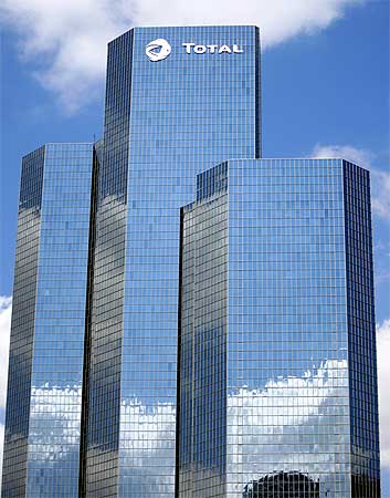 Logo of French oil company Total is seen on a building in the financial district of la Defense near Paris.