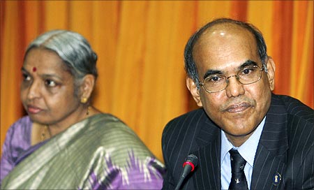 Reserve Bank of India's Governor Duvvuri Subbarao (R) speaks as deputy governor Shyamala Gopinath watches during a meeting with bankers.