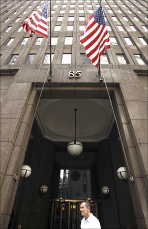 A man walks past the Goldman Sachs headquarters building in New York.