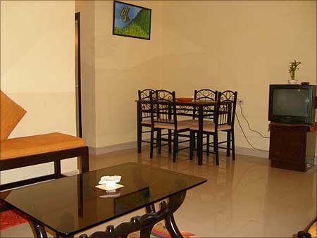 A living room in a 1 BHK