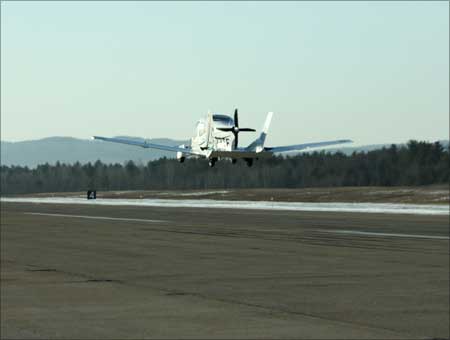 The first flight of the Terrafugia Transition in Plattsburgh, NY. Photo taken from chase truck.