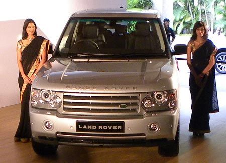 Models pose with the The Range Rover Sport