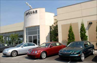 New Jaguar automobiles sit on the lot at a Jaguar and Land Rover car dealership in Louisville, Kentucky. | Photograph: John Sommers II/Reuters
