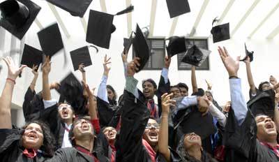 Happy Indian students graduating from their class. | Photograph: Krishnendu Halder/Reuters