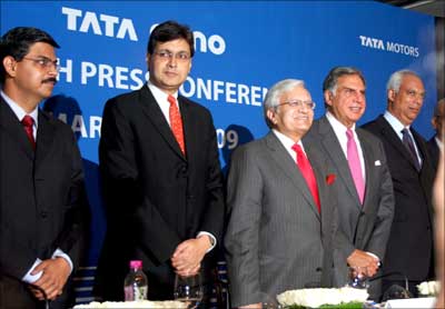Tata Group chairman Ratan Tata (2nd from right); Tata Motors MD Ravi Kant (3rd from right); Rajiv Dubey, Tata Motors president, passenger cars division (2nd from left); at the launch of the Tata Nano in Mumbai on Monday.