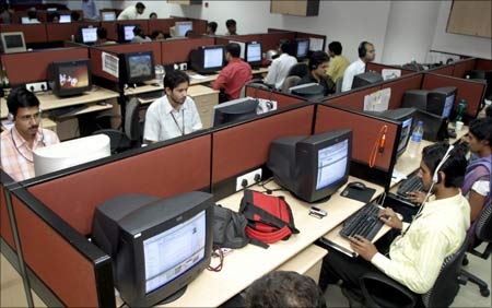 People work inside an IT company at an IT park in Chandigarh.