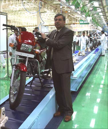 Pawan Munjal, managing director of Hero Honda Motors, poses inside Hero Honda's plant in Haridwar.
