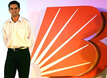 Indian batsman Rahul Dravid poses to mark the rebranding of Bank of Baroda.