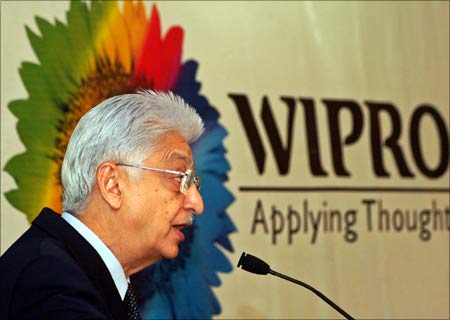 Chairman of Wipro Ltd, Azim Premji, speaks during a news conference.