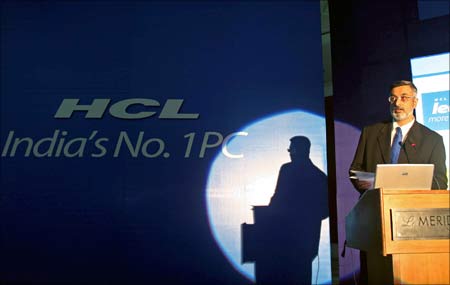 George Paul, executive vice president of marketing, HCL Infosystems, speaks during a news conference in New Delhi in February, 2006.