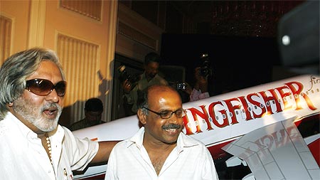 Vijay Mallya (L), United Breweries (UB) group chairman, Capt Gopinath.