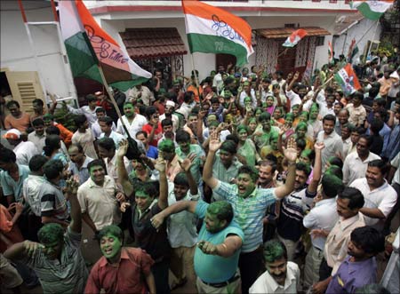 Supporters of Mamata Banerjee, chief of the regional Trinamool Congress, an ally of Congress, celebrate the party's historic victory.