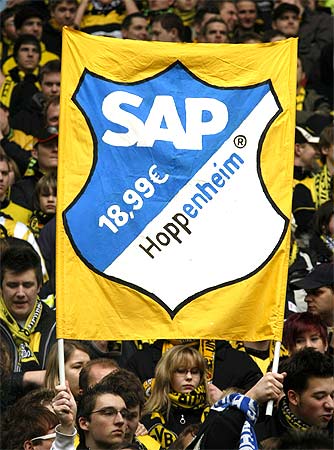 Borussia Dortmund supporters hold up a sign before the German Bundesliga soccer against Hoffenheim in Dortmund February 28, 2009. Dietmar Hopp is German billionaire and co-founder of software company SAP and sponsor of TSG 1899 Hoffenheim.