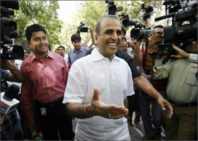Bharti Chairman Sunil Mittal arrives to cast his vote at a polling station in New Delhi.