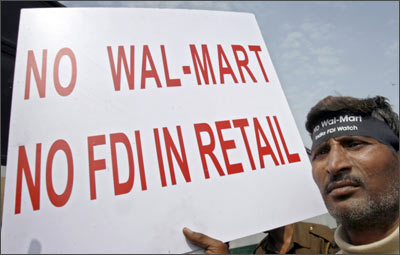 An activist from the Left parties protests against the entry of Wal-Mart into the Indian market.