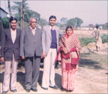Dipak, with his parents and younger brother.