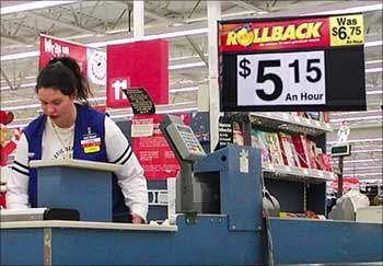 A cashier at work at a Wal-Mart store.
