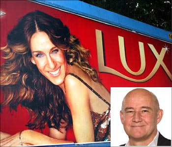 American actress in Unilever's billboard poster. Inset: Douglas Baillie.
