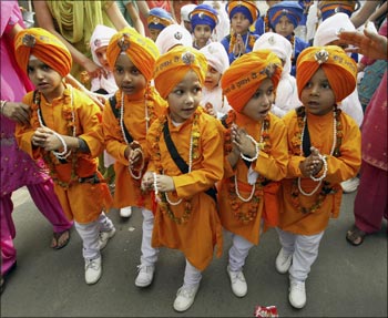 Sikh boys dressed as the five beloved Sikh Gurus.