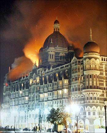 Smoke and flame billow from the Taj Hotel in Mumbai on November 27, 2008.