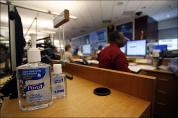 Hand sanitizers sit on desks at the Center for Disease Control Emergency as the H1N1 flu virus is monitored at the centre in Atlanta.