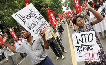 Activists shout anti-WTO slogans during a protest in New Delhi.