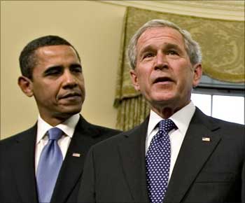 Obama with former US President George W Bush.