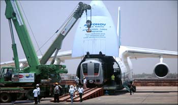 An Antonov cargo aircraft carrying a new metro rail carriage sits on tarmac at the cargo terminal of the Indira Gandhi International Airport in New Delhi.