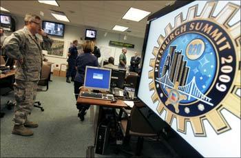 Image: A Pennsylvania National Guard officer at the Multi-Agency Communications Center in Pittsburgh.