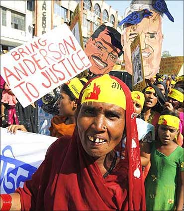 Local activists stage a demonstration to mark the 25th anniversary of the Bhopal gas disaster.