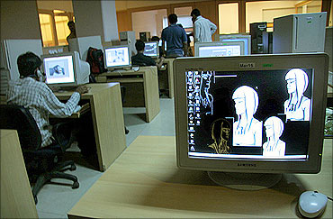 Indian animation designers work on a production floor in Mumbai.