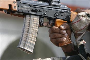 A soldier from the Central Industrial Security Force, which is in charge of airport security, holds a rifle at the international airport in New Delhi. Photograph: Desmond Boylan/Reuters