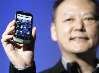 Peter Chou, chief executive of HTC, displays the Google Nexus One smartphone.