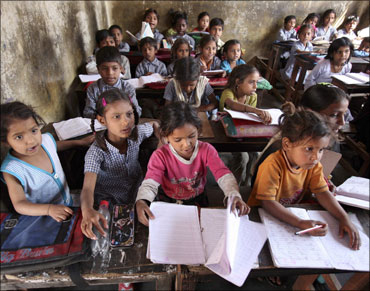 Students study in a classroom of a government-run school.