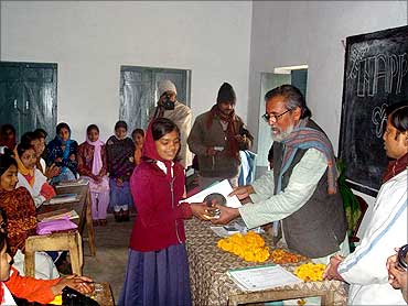 Anil Gupta with villagers.