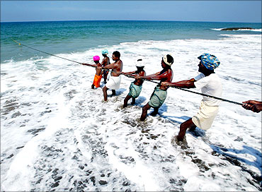 Fishermen pull in their catch in Kovalam Beach, about 20 km (12 miles) south of Trivandrum.