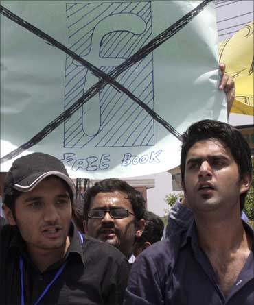 Pakistani students shout slogans during a protest against Facebook in Lahore.