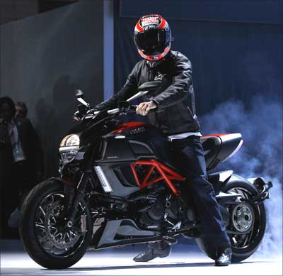 Professional motorcycle racer Nicky Hayden rides a Ducati Diavel Carbon.