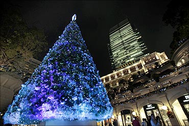 A Christmas tree is lit up outside a shopping mall in Hong Kong.