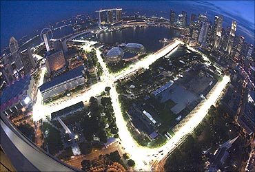 An aerial view shows the illuminated Marina Bay street circuit of the Singapore Formula One Grand Prix.