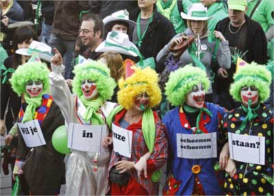 Workers in the non-profit sector, which includes nurses and social workers, dressed up as clowns.