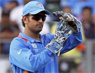 MS Dhoni asks for a review by the third umpire for the wicket of Nuwan Kulasekara.