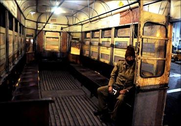 The lone traveller on an evening tram is the conductor himself with the proverbial monkey cap on.