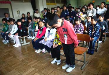 Students at Kamaishi elementary school after the area was devastated by the March 11 earthquake and tsunami.