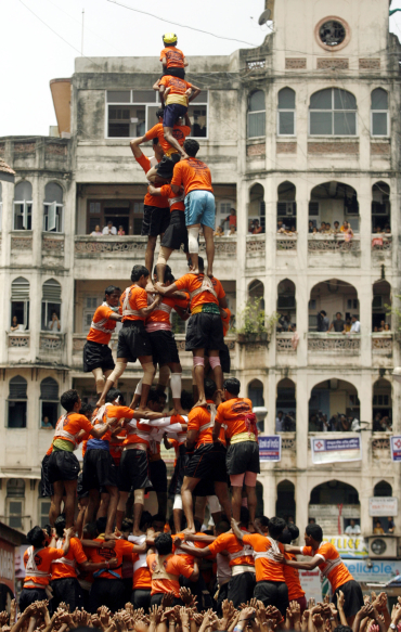 Devotees form a human pyramid during the celebrations of Janmashtami in Mumbai