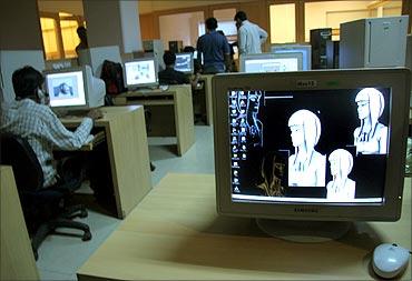 Indian animation designers work on a production floor in Mumbai.