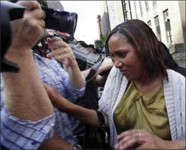 Nafissatou Diallo (C), the Manhattan maid who has accused Dominique Strauss-Kahn of sexually assaulting her.