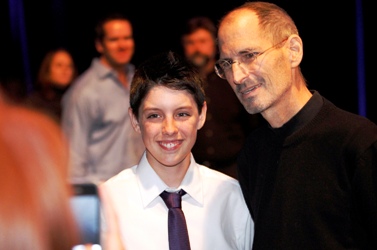 Steve Jobs poses for a photo with Connor Ellison at the Apple Worldwide Developers Conference.