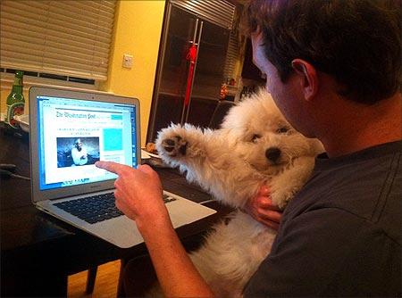 Mark Zuckerberg with Beast, his Hungarian sheepdog.