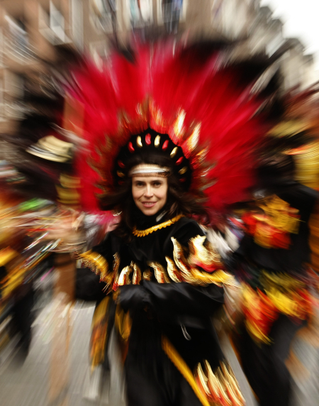 A reveller takes part in the traditional Rose Monday carnival parade in the western German city of Duesseldorf.